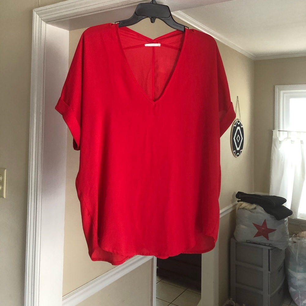 Relaxed fit boutique v neck top